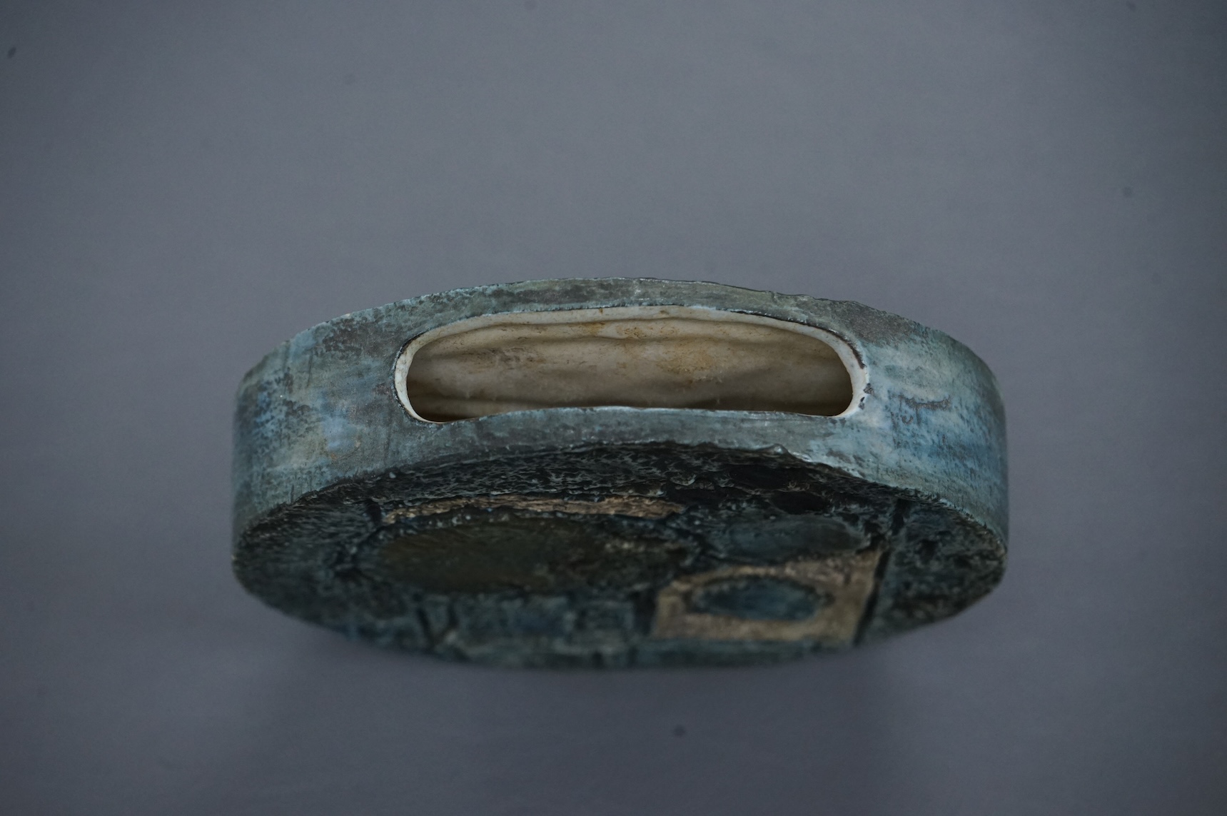 A small Troika wheel vase, initialled by Linda Taylor, 12cm